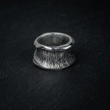 Back view of silver ring 'Talon' – open band and sculptural flow by Myon Rox