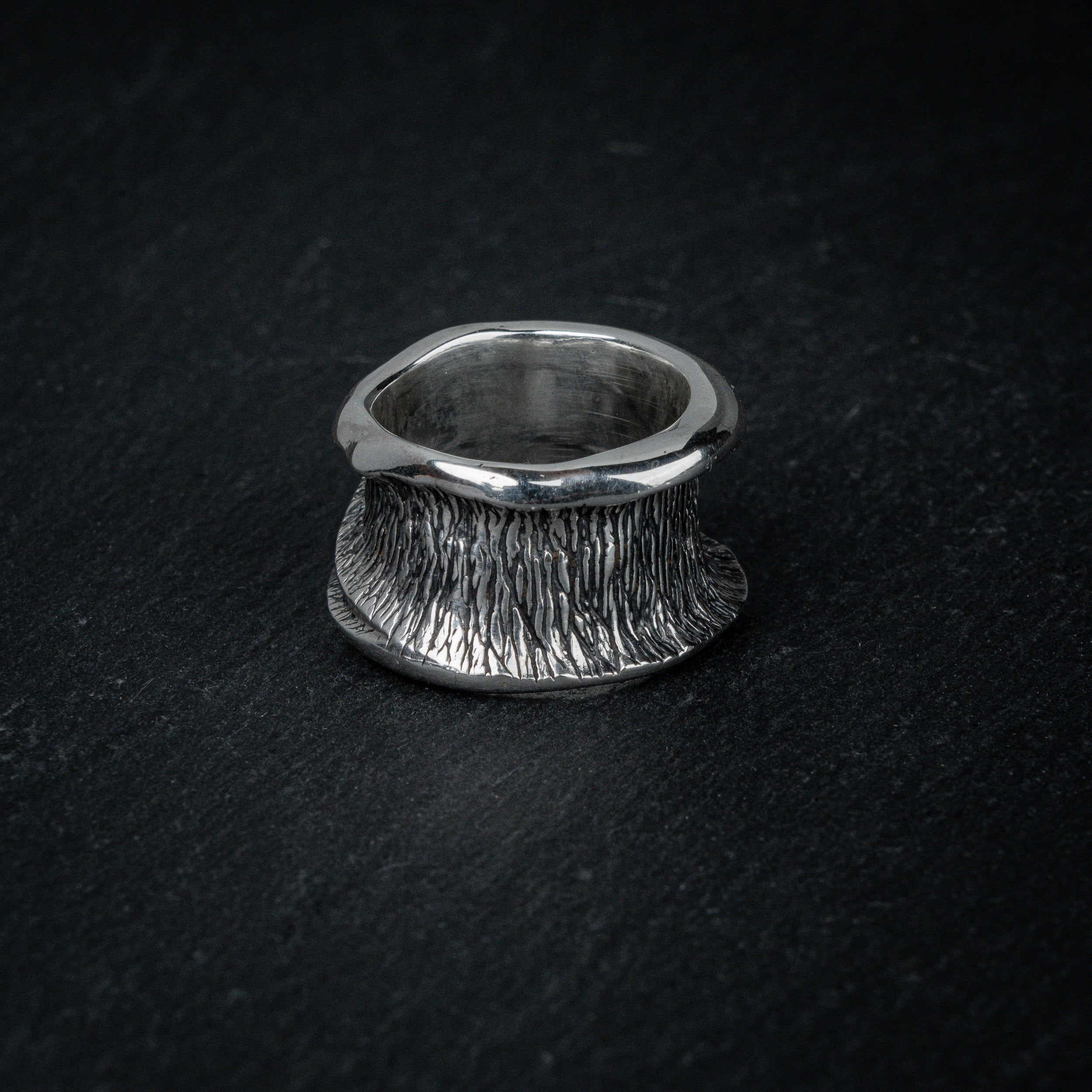Back view of silver ring 'Talon' – open band and sculptural flow by Myon Rox