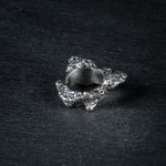 Sculptural silver ring 'Tephra' by Myon Rox – asymmetric open band, molten texture, unisex design, back view