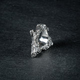 Sculptural oxidized silver ring 'Tephra' by Myon Rox – asymmetric open band, molten texture, unisex design, standing