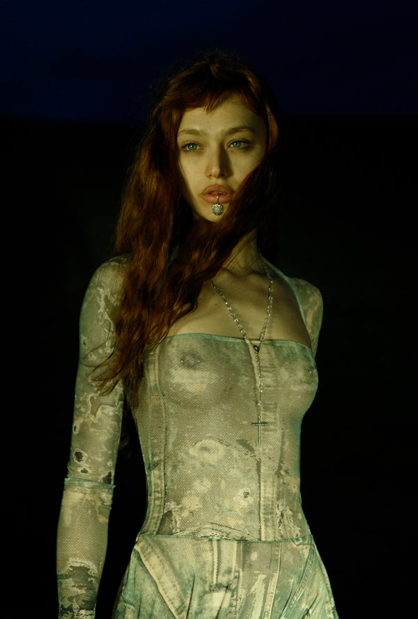Instagram post featuring Chudnyy wearing a custom sterling silver chin cuff with a moonstone, created by MYON ROX.